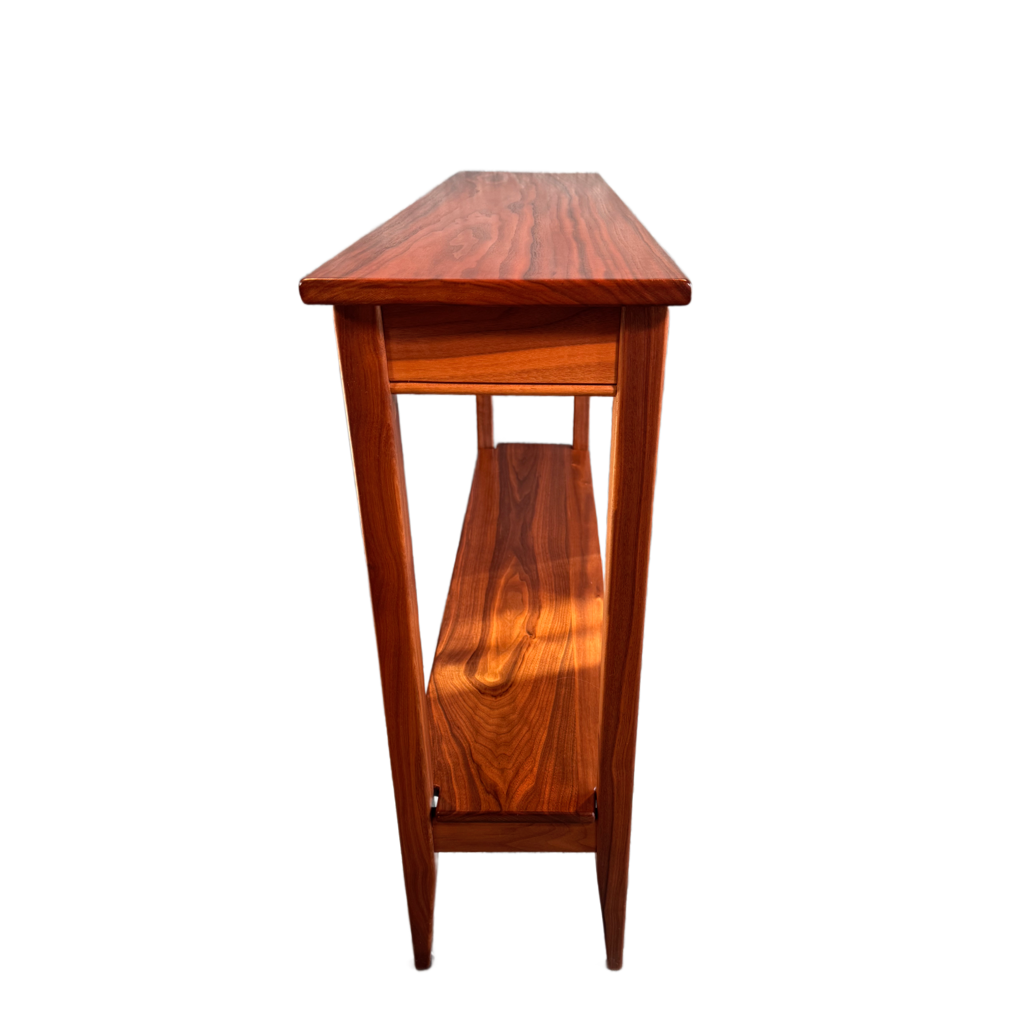Tall wooden cabinet with glass doors and a reddish finish.